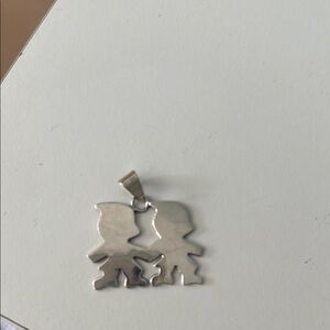Beautiful sterling silver boy charm.